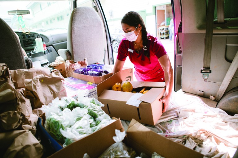 Kokua_Kalihi_Valley_Loading_Food_Boxes_Van