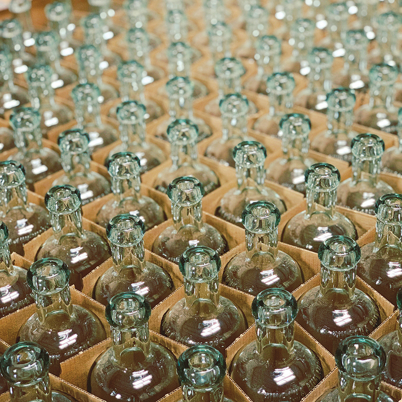row of kuleana rum bottles