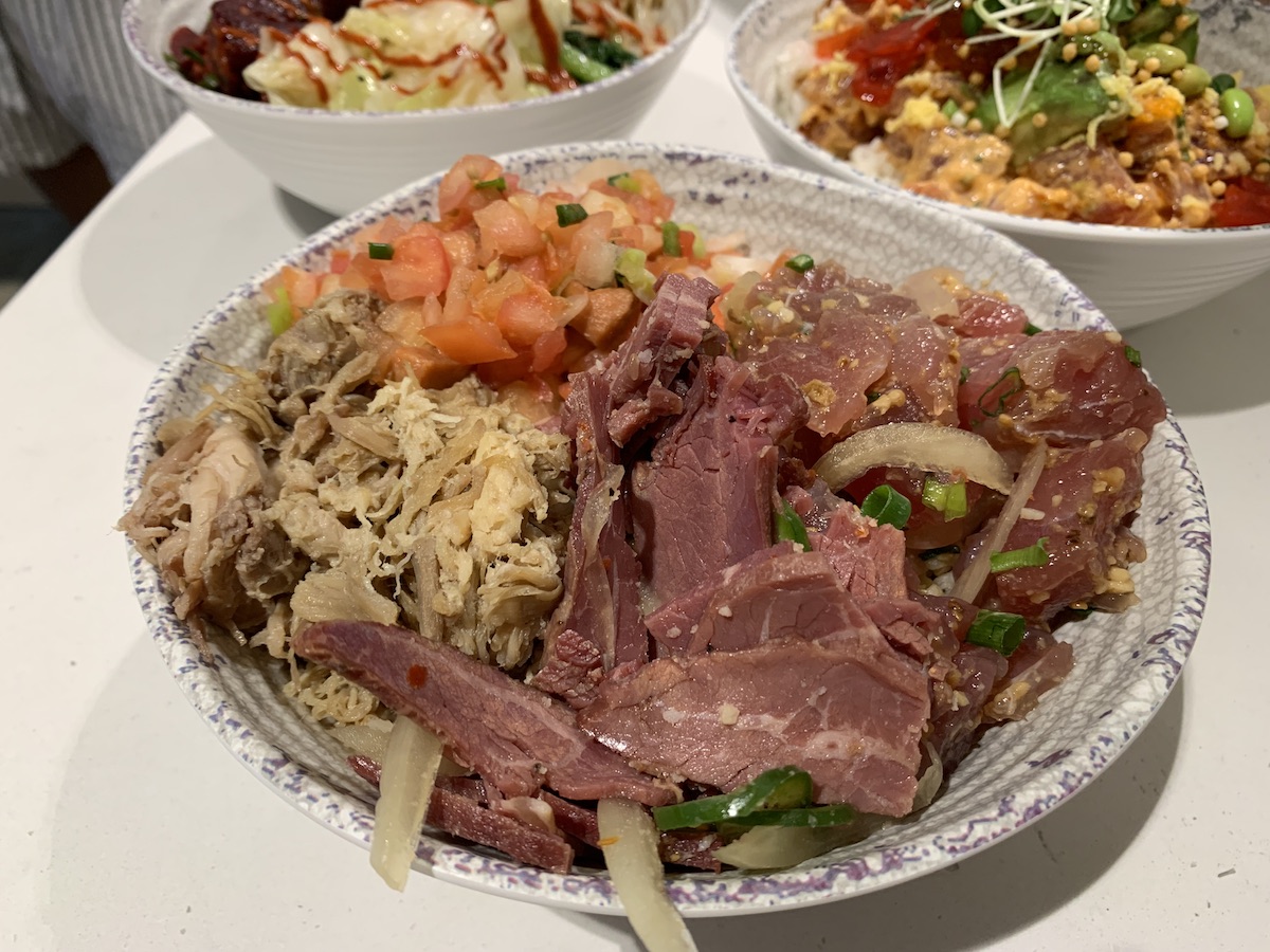  /><figcaption>This poke bowl is topped with kalua pig, pipi kaula, lomi tomato, fried limu, inamona and a sunny egg.<br />
<em>Photo: Jackie Kojima</em></figcaption></figure>
</div>
<p>Whether you want to make a quick stop for some poke, grab a drink and late night snack at the bar or enjoy a sit-down meal with loved ones, you can do it all at Redfish.</p>
<p><em>Redfish Poke Bar by Foodland, 685 Auahi St., Honolulu, Oahu. Poke counter is open daily from 10:30 a.m. to 8:30 p.m. Restaurant and lounge open from 10:30 a.m. to midnight Sunday through Wednesday; 10:30 a.m. to 2 a.m. Thursday through Saturday. <a href=