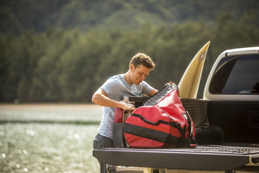 Young Man On Surfing Road Trip In Hawaii.