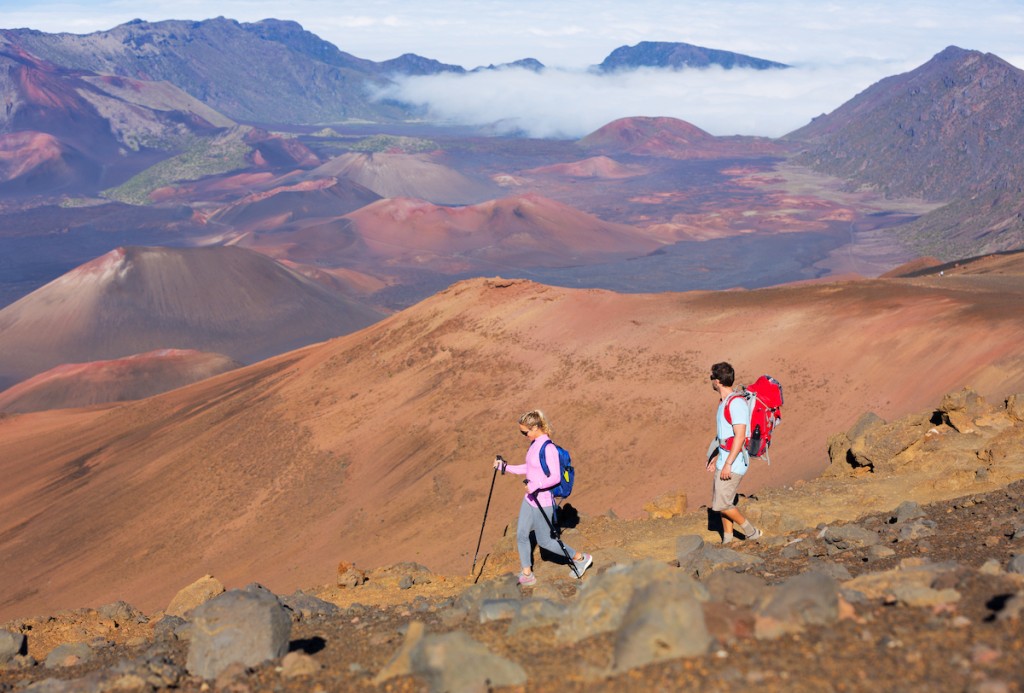 Hikers Enjoying Walk On Amazing Mountain Trail