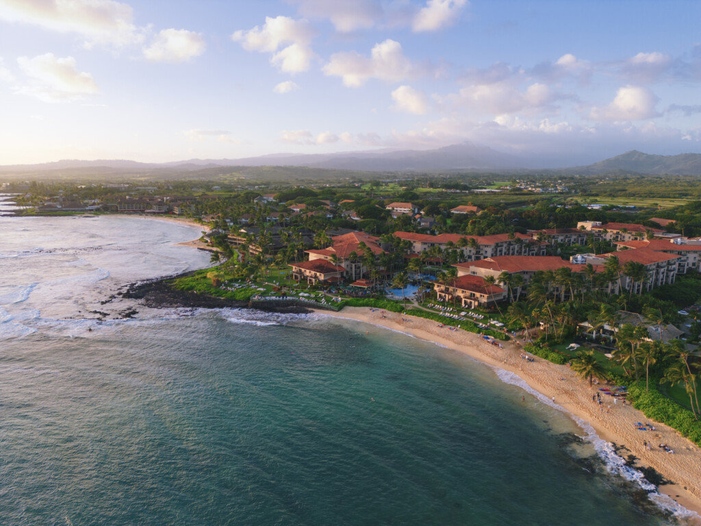 Aerial Of Poipu Beach During Sunsetin Kauai Hawaii Usa