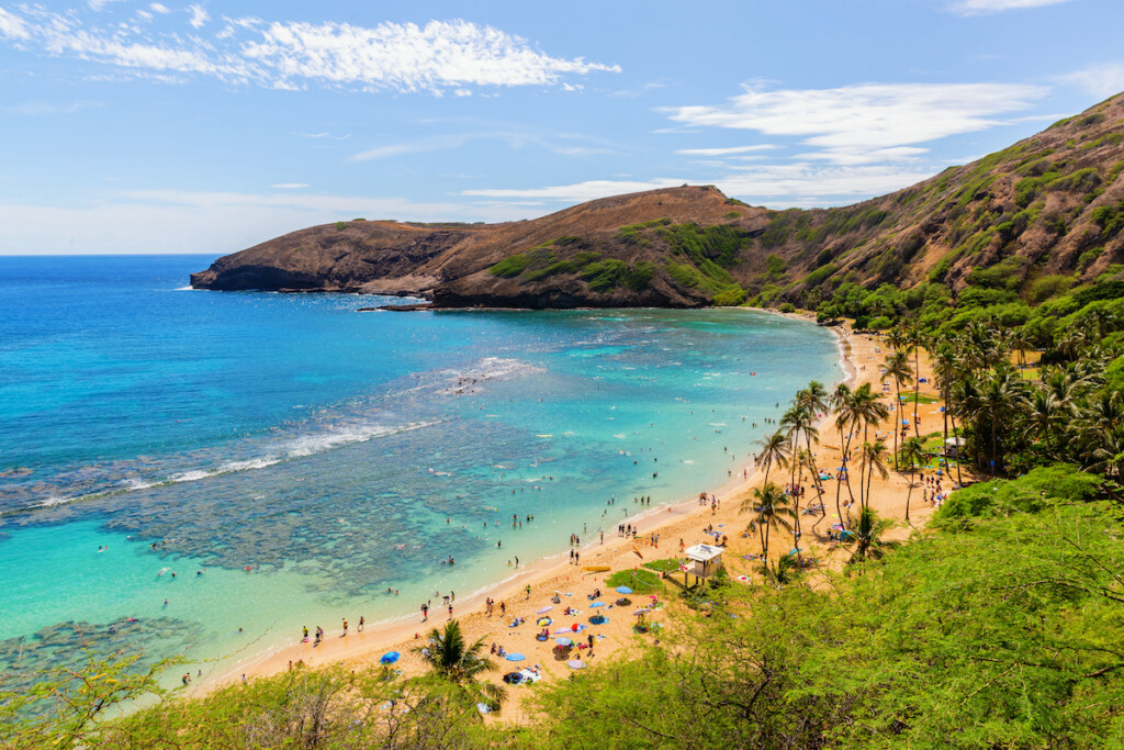 Paradisial Beach With Unrecognizable People At Hanauma Bay, Oahu, Hawaii