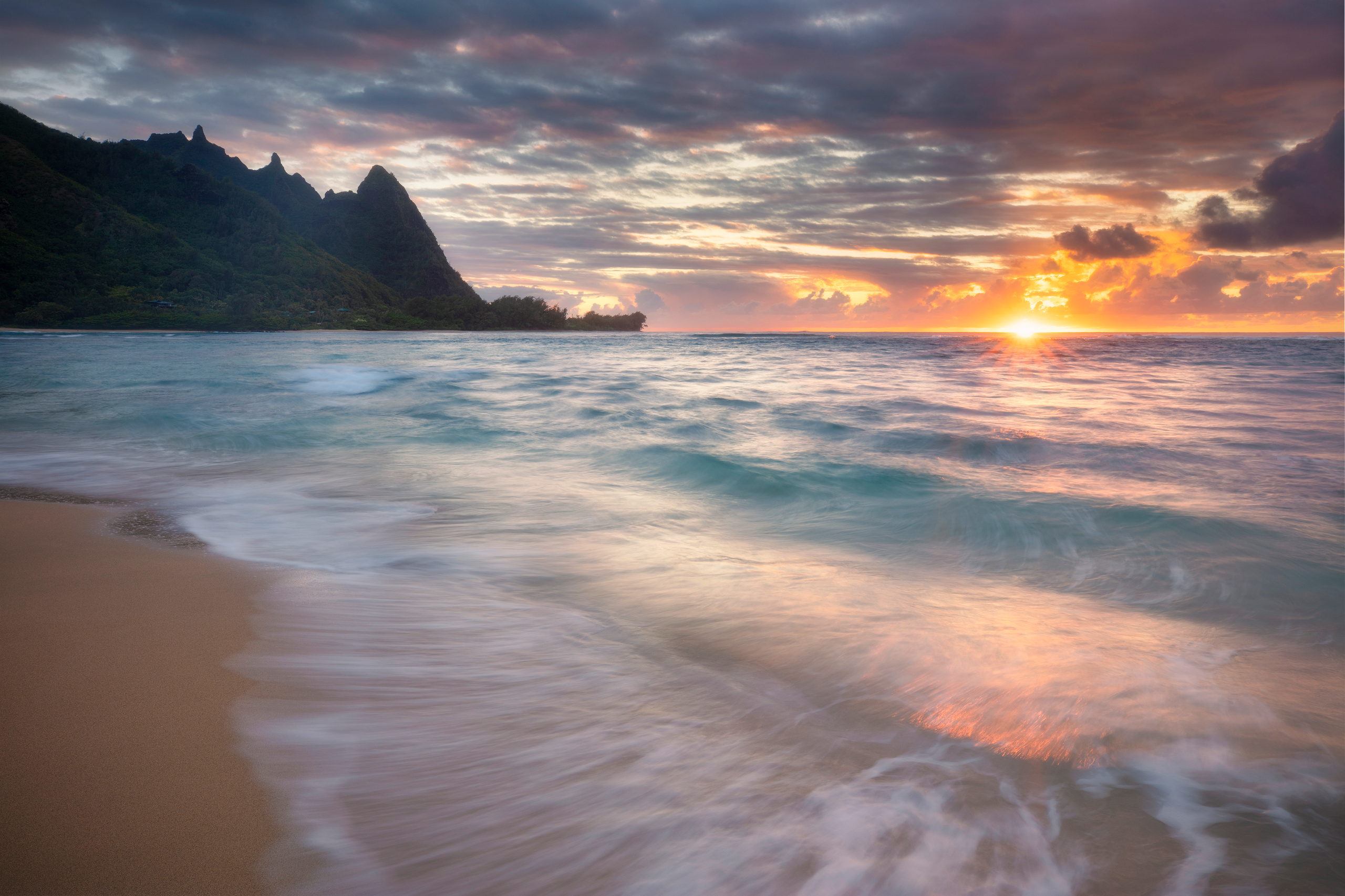 Sunset at Tunnels Beach Sunset at Tunnels Beach — photograph by Jeff Nigro